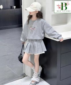 Set Váy Bé Gái Chất Nỉ Da Cá 4C Áo Form Rộng Nơ Mix Chân Váy Xếp Ly Viền Ren Từ 12-45Kg Dành Cho Bé Gái