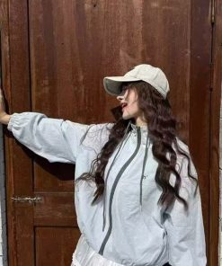 áo Khoác Dù Nữ Form Rộng Có Nón Thêu M– áo Gió Nữ Chống Nắng Nhẹ Thoáng, Khóa Kéo Full Zip Trendy - Htm Fashion